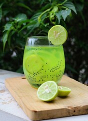 Es kuwut. A drink made from young coconut water and lime originated from Bali, Indonesia.