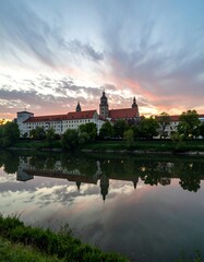 Fototapeta premium City by River at Sunset