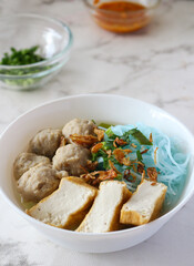 Bakso. A bowl of Indonesian meatball with noodle and tofu.