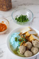 Bakso. A bowl of Indonesian meatball with noodle and tofu.