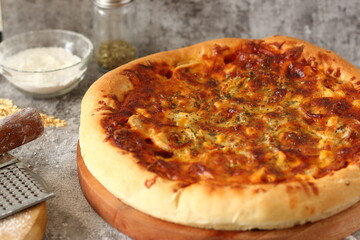 Pizza with beef and sausages topping. pizza with bolognese sauce. 