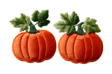 Embroidered pumpkins with green leaves