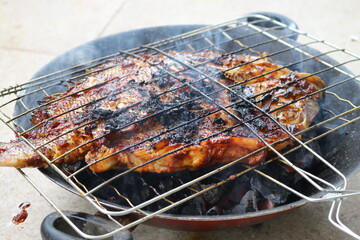 Ikan bakar. Grilled fish.