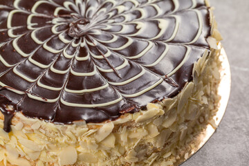 Esterhazy cake. Cake decoration. Chocolate glaze. Frosting decoration