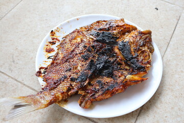 Ikan bakar. Grilled fish.