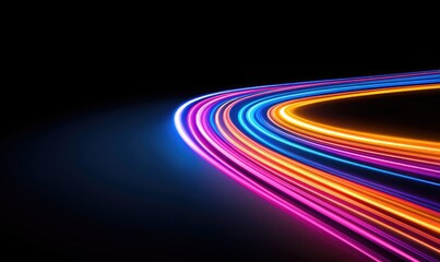 A dynamic visual, showcasing flowing trails of vibrant, multi-colored light against a deep black backdrop, creating a sense of movement and energy.