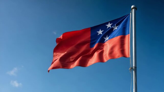 The vibrant flag of Samoa flutters against a bright blue sky, symbolizing national pride during Independence Day festivities.