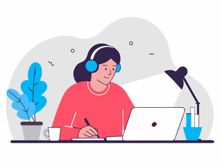 Freelancer woman working from home with headphones laptop notebook