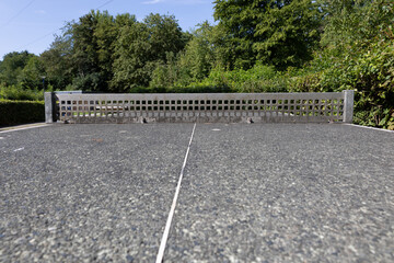 a stone table tennis table in a park