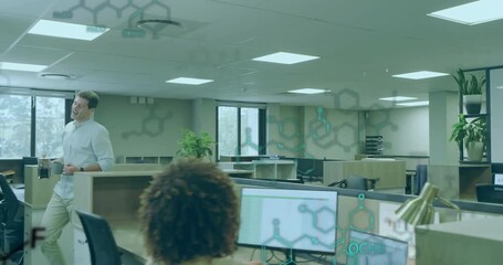 Male walking with press pot through office pouring coffee mug amid floating chemicals to serve peer - Powered by Adobe