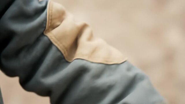 Detailed Views of Patched and Well-Maintained Sleeves on Garments showing different conditions