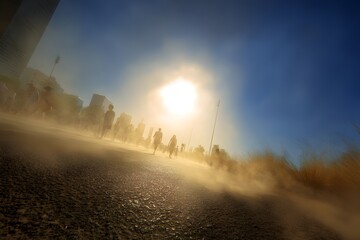 People suffering from extreme heat during a hot summer day symbolizing climate change and global warming impact. Sweaty tired people under the sun during extreme hot weather. Overheated people 