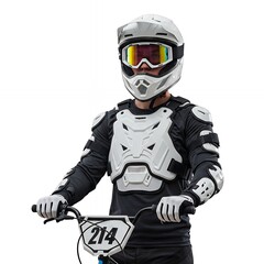 Obraz premium Professional BMX rider wearing white helmet and protective armor gear holding number 214 plate on black motocross bike isolated on white background