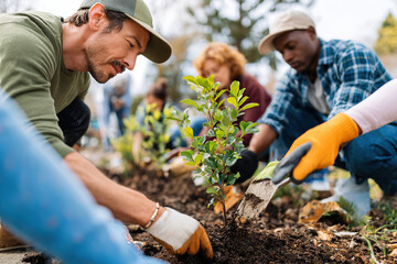 Activists engage in tree planting initiative to promote environmental awareness and sustainability