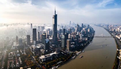 Obraz premium Nanjing skyline with zifeng tower and yangtze river emerging from fog