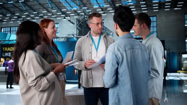 People Talking At Technology Showcase