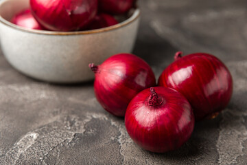 Shallot onion on the kitchen table. onion slice. onion rings. Fresh red Onion. Natural, fresh, vegetarian food. Agricultural products. Healthy eating. Vegetables. Farmer's market.