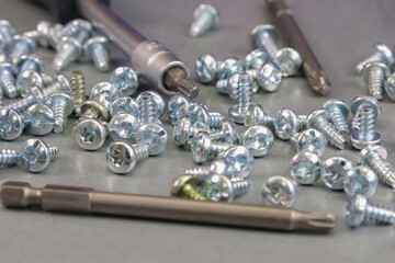 Metal screws for attaching equipment to metal surfaces. 