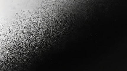 Abstract black and white background with textured surface. Gritty and grainy pattern creating a moody atmosphere.