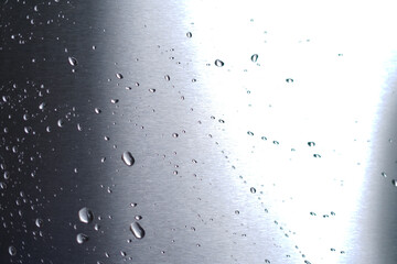 Waterdrops Texture on Metal and Glass Surface Closeup.
