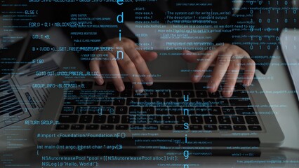 Close-up view of hands typing on a laptop, surrounded by glowing code and digital elements, symbolizing technology, programming, and modern workspace efficiency. Xenic