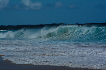 big wave breaking on the beach