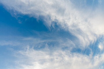 Scenic spring afternoon sky with fluffy white clouds over Esna Lock on the Nile River, Egypt. Perfect blue sky captured during cruise journey to Luxor Temple.