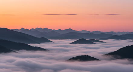 Fototapeta premium Mountain landscape with sunrise and thick fog in the valleys