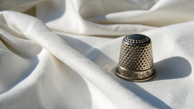 needle and thread - Powered by Adobe