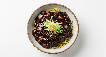 A bowl of Korean Jajangmyeon noodles with black bean sauce, topped with fresh cucumber and sesame seeds.
