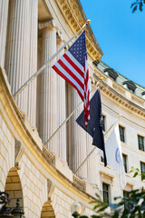 United States flag flies proudly on Washington government building, representing American patriotism