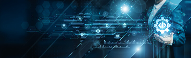 Businessman holding building of software development projects, programming coding design testing...