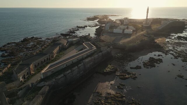 Aerial perspective of Avanzada de Santa Isabel at sunset, Cadiz, southern Spain.