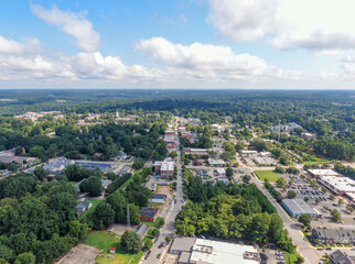 Sunny Daytime Drone Images of Wake Forest, North Carolina Featuring the Downtown Historic District, Businesses, and Residential Developments: Tourism, Real Estate, Travel