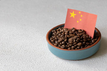 Fresh Chinese hazelnuts in shell in bowl in close-up