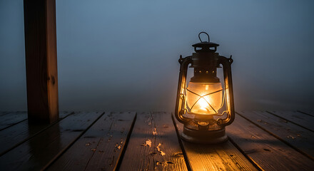 Illuminated lantern on wooden planks in foggy weather providing warm light in the darkness around it ai generated