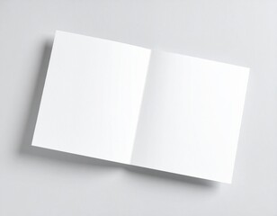 Fototapeta premium Blank Card Mockup Open Book White Paper on Gray Background Copy Space for Design