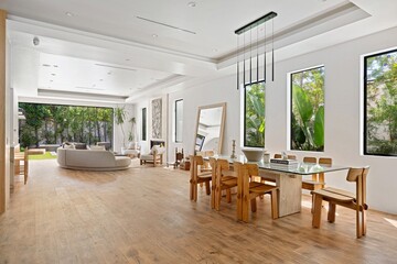 Stunning Indoor-Outdoor Estate with Lush Landscaping and Contemporary Finishes