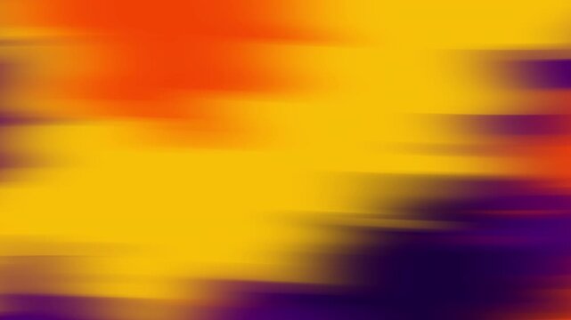 Abstract blurry image with swaths of yellow, orange, and purple colors. Suitable for backgrounds, artistic projects, and colorful designs.