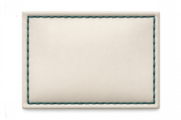 White clothing label with green stitching, highlighting subtle branding details and textile manufacturing craftsmanship for fashion design presentations