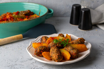 Traditional Homemade Turkish Food Kofte - Kofta with Tomato Sauce and Potatoes. (Turkish name; Izmir kofte)