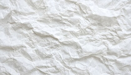 Obraz premium This is a full frame close-up shot of white crumpled paper, showing its detailed texture with many folds and shadows, creating a bright background.