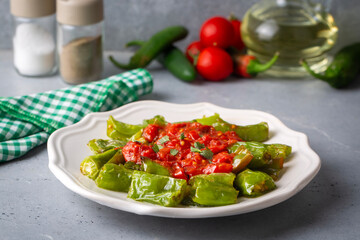 Fried peppers with tomato sauce