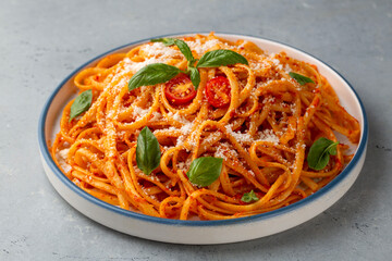 Flat spaghetti pasta with delicious tomato sauce and parmesan cheese.