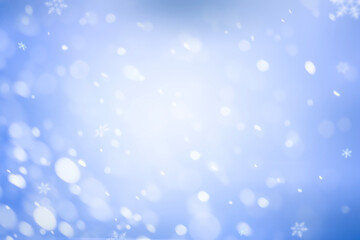 Abstract blurred defocused light background for Christmas. Light snow background.