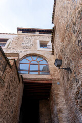 Old Building Architecture: An eye-level shot of a historical building showcases its impressive architecture, featuring unique details, in a photorealistic display.