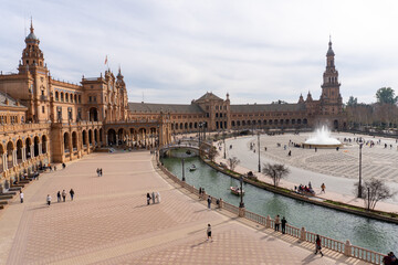 Seville Plaza Architecture: An expansive overview of a stunning architectural marvel, a meticulously designed plaza with its ornate buildings.