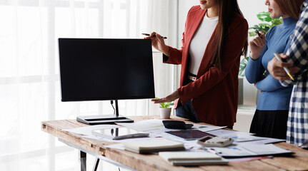 Analyze financial data and accounting record with calculator in meeting office, Accounting company charts and graphs banner, double exposure successful business finance and taxation planning concept.	