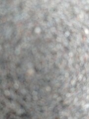 Close-up of Rough Textured Gray Stone Surface in Natural Light