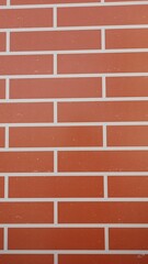 Red Brick Wall with Horizontal Pattern in Urban Setting